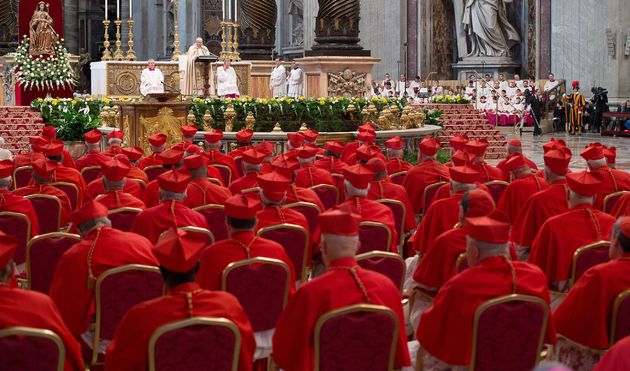 The College of Cardinals listening to Pope Francis