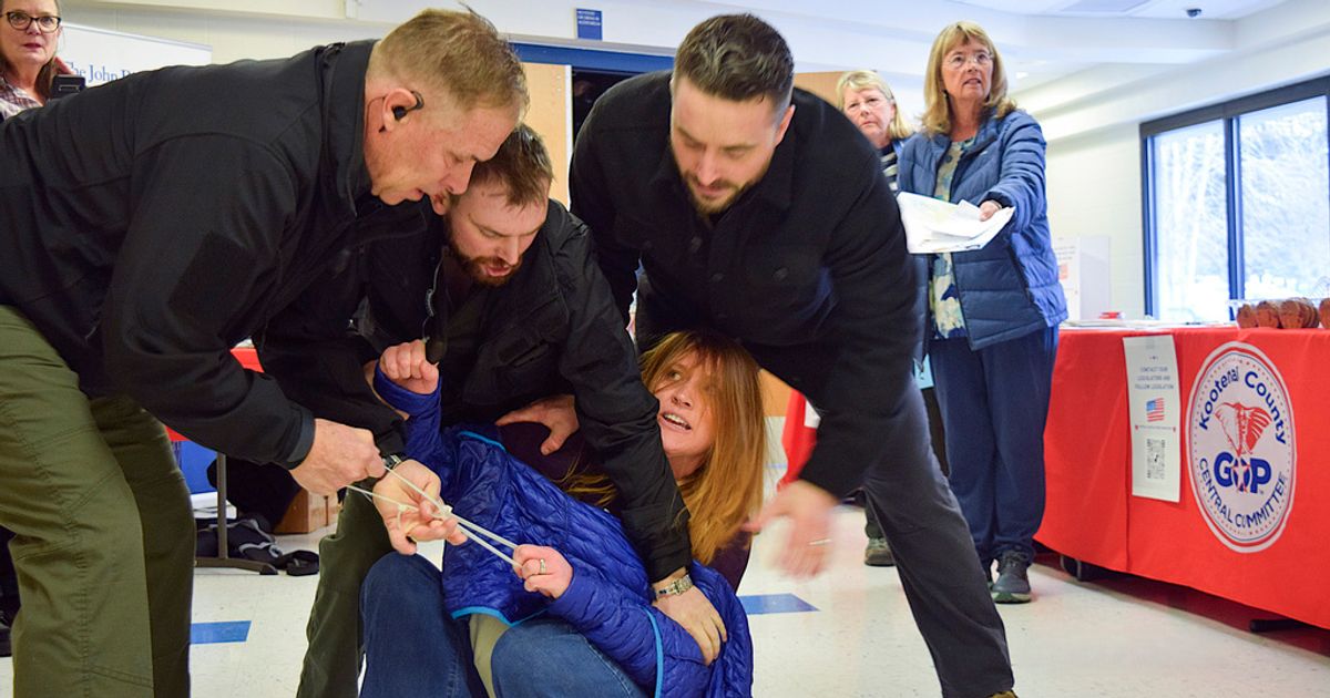 Woman Removed For Heckling Speakers At Idaho Town Hall Meeting