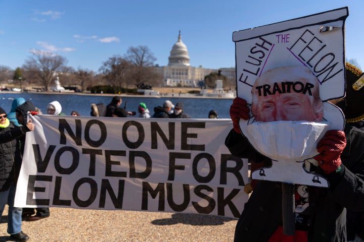 Demonstrators rally during the "No Kings Day" protest on Presidents Day in Washington in support of federal workers and against recent actions by President Donald Trump and Elon Musk.