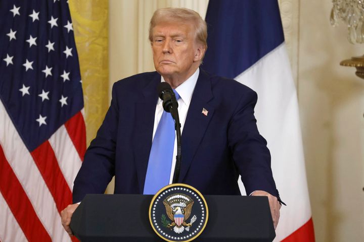 President Donald Trump listens during a joint press conference with France's President Emmanuel Macron in the East Room of the White House in Washington, Monday, Feb. 24, 2025. 