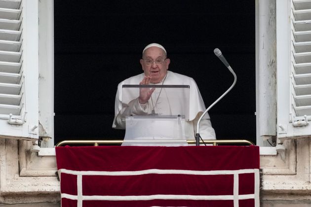 Pope Francis delivers his blessing as he recites the Angelus noon prayer from the window of his studio overlooking St.Peter's Square, at the Vatican, Sunday, Jan. 19, 2025. (AP Photo/Andrew Medichini)