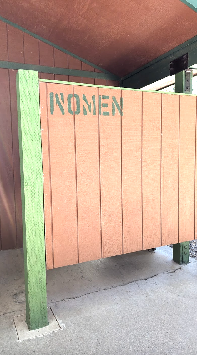 The entrance to the women's bathroom at the park, with 