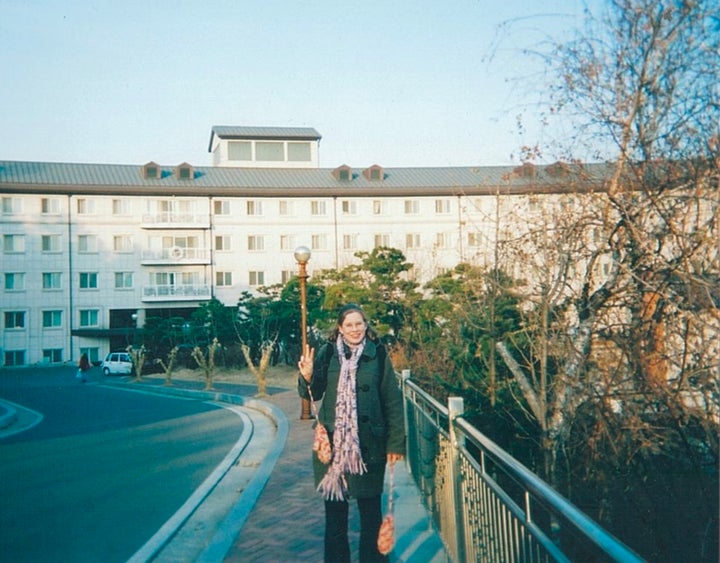 The author in front of her dormitory at Ewha Womans University in Seoul in 2001.