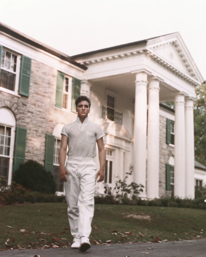 Elvis Presley strolls the grounds of his Graceland estate in circa 1957. During a Tuesday appearance in federal court, a Missouri woman admitted to being behind an audacious plot to fraudulently sell off the estate.