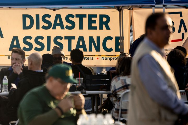 People impacted by the Los Angeles-area wildfires seek information and relief at a FEMA Disaster Recovery Center at Pasadena City College on Jan. 16, 2025. 