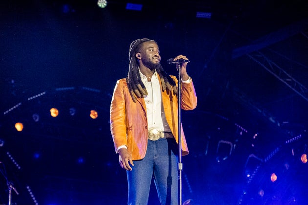 Shaboozey on stage in Nashville last year