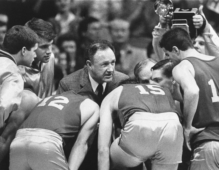 Actor Gene Hackman gives fictional Hickory High basketball players instructions during the 1985 filming of the final game of the movie "Hoosiers" at Hinkle Fieldhouse on the Butler University campus in Indianapolis.