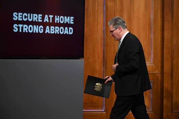 Britain's Prime Minister Keir Starmer leaves after delivering a statement on Defence spending at Downing Street in London, Tuesday, Feb, 25, 2025. (Leon Neal/Pool photo via AP)