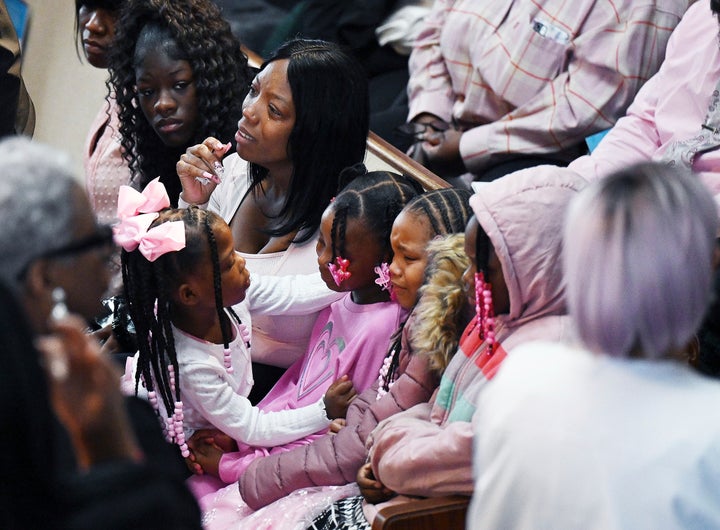 Tateona Williams pictured before the start of the funeral services for her two children at Triumph Church on Feb. 20 in Detroit.