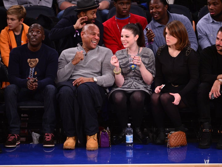 Michael K. Williams, Michelle Trachtenberg and Princess Eugenie of York attend the Atlanta Hawks vs New York Knicks game at Madison Square Garden on Dec. 14, 2013 in New York City.