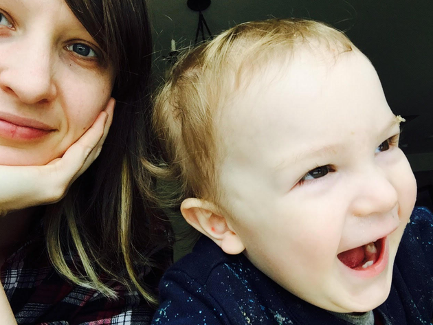 The author and her son watching the snow fall