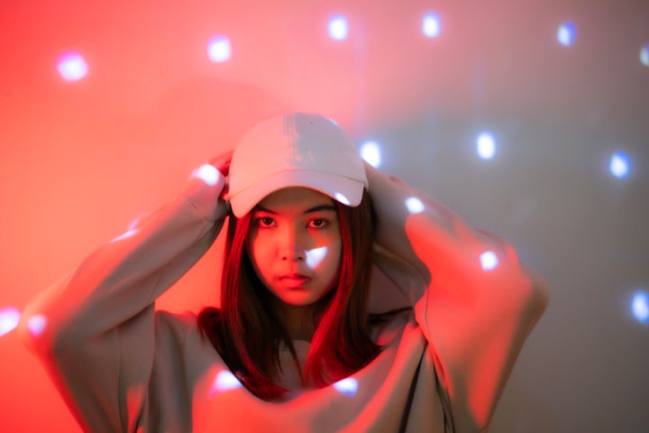 Some red light caps look as simple as a baseball cap from the outside.