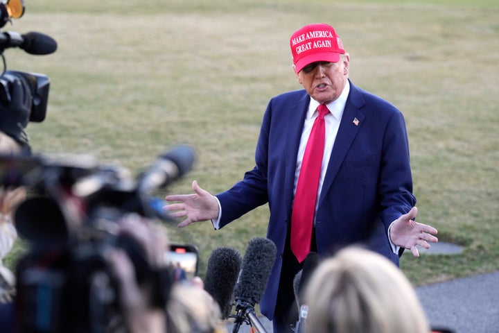 President Donald Trump speaks to reporters before departing on the South Lawn of the White House, Friday, Feb. 28, 2025, in Washington. (AP Photo/Jacquelyn Martin)