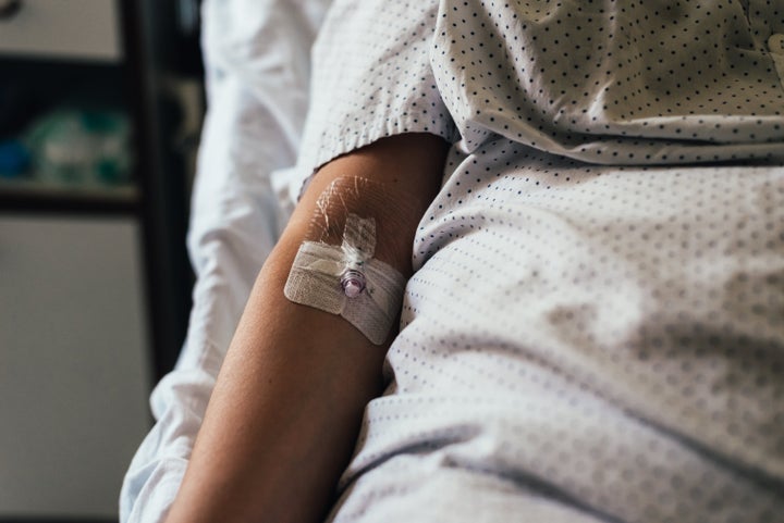 Arm of a person in the hospital after a blood draw