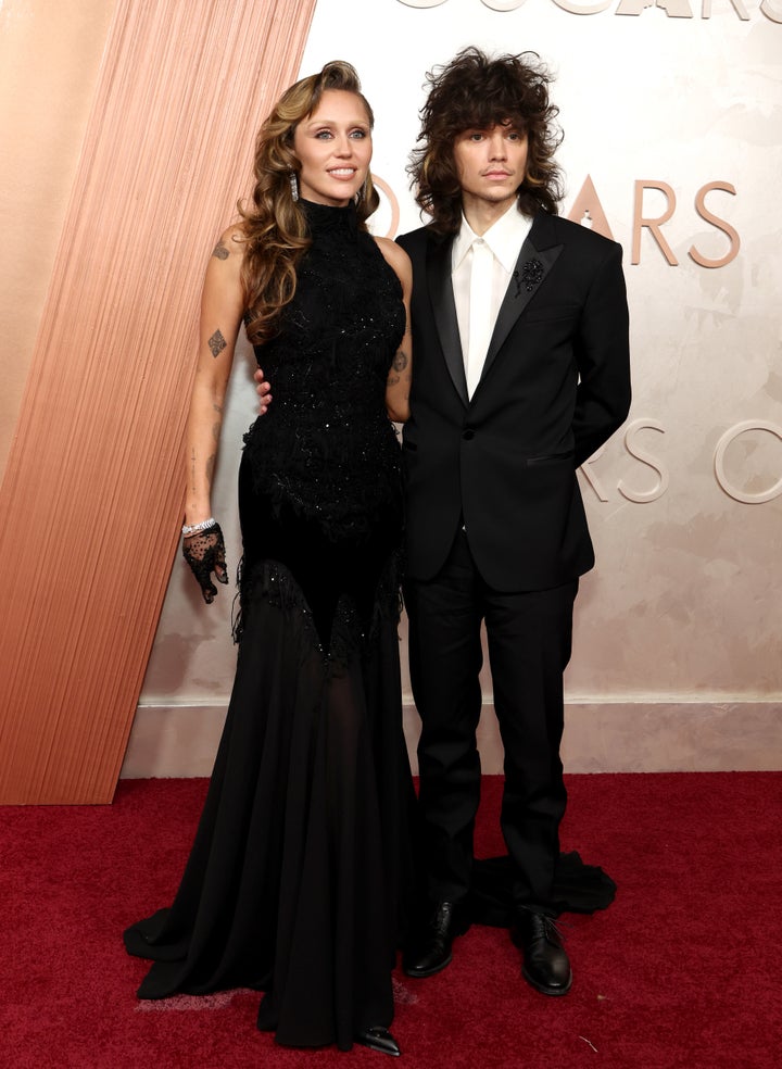 Cyrus and Maxx Morando on the red carpet.
