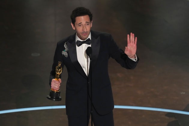 Adrien Brody on stage at the 2025 Oscars