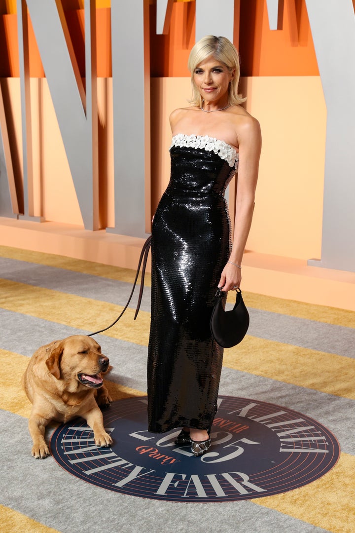 Selma Blair attends the 2025 Vanity Fair Oscar Party with her service dog, Scout, on Sunday.