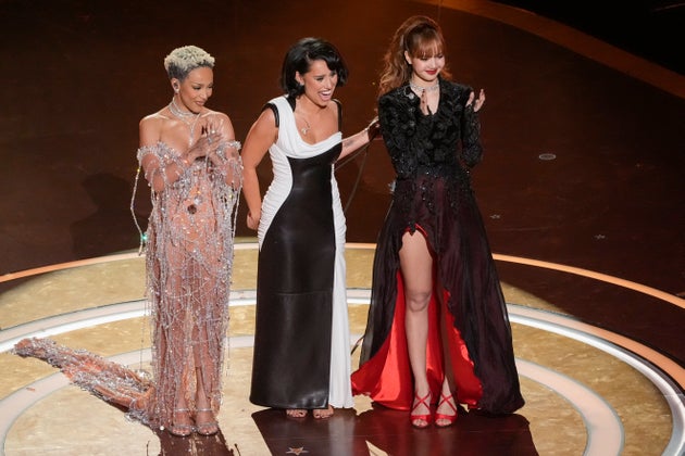 Doja Cat on stage with collaborators Lisa and Raye at the Oscars