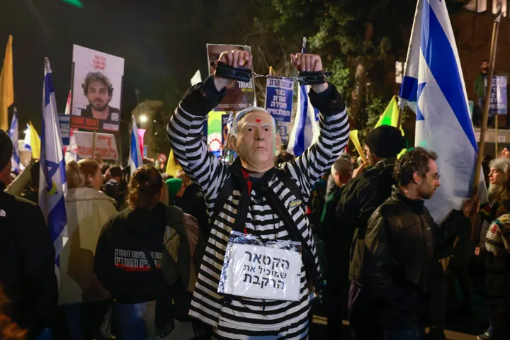 Relatives and supporters of hostages kidnapped by Hamas in October 2023 rally outside the prime minister's residence in Jerusalem on March 2, 2025, calling for a deal that would bring all the remaining captives back.