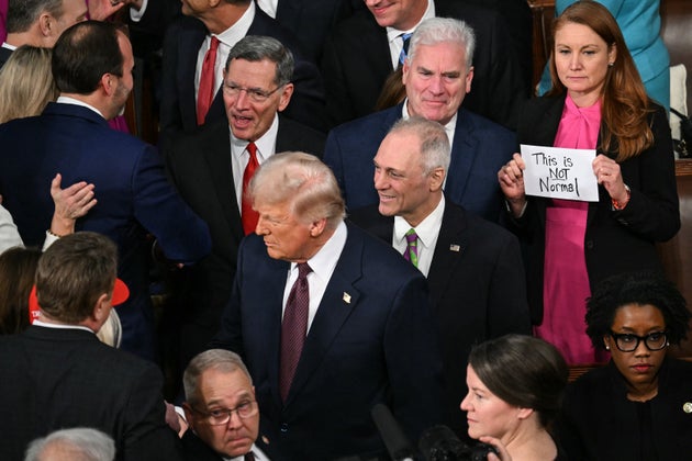 Representative Melanie Stansbury, a Democrat from New Mexico, holds a sign reading 