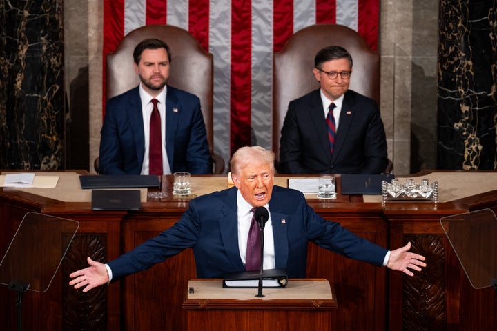 President Donald Trump delivers his address to a joint session of Congress in the U.S. Capitol on Tuesday. Vice President JD Vance and Speaker of the House Mike Johnson (R-La.), listen behind.