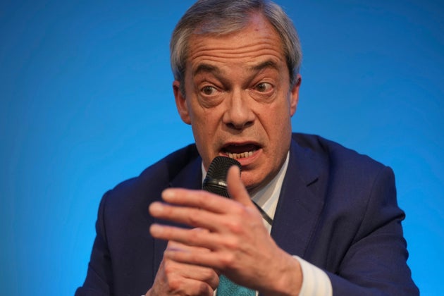 Reform UK leader Nigel Farage attends a press conference on the economy and renewable energy, in London, Wednesday, Feb. 12, 2025. (AP Photo/Kin Cheung)