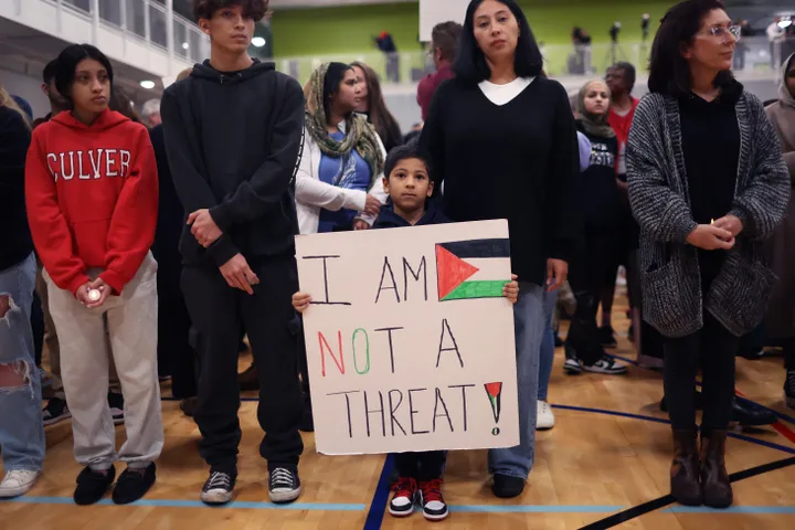 Community members attend a vigil at the Prairie Activity and Rec Center for 6-year-old Palestinian American Wadea Al-Fayoume, on Oct.17, 2023 in Plainfield, Illinois.