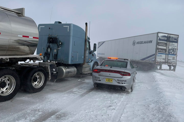 In this photo provided by the Iowa State Patrol, a jackknifed semi truck blocks both eastbound lanes on U.S. 20 east of Fort Dodge, Iowa, on March 5, 2025.