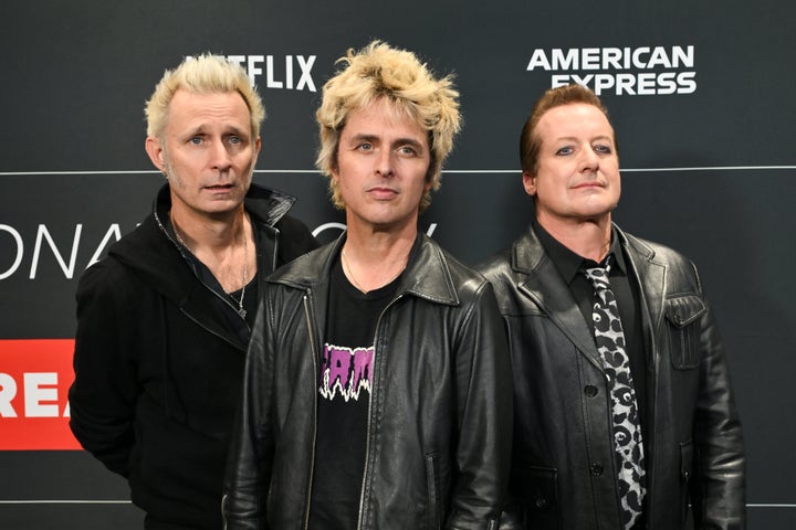 Green Day's Billie Joe Armstrong (center) called out JD Vance during a concert over the weekend. Also pictured are Green Day's Mike Dirnt (left) and Tré Cool.