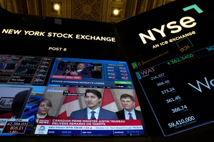 Traders work on the floor of the New York Stock Exchange (NYSE) in the Financial District in New York City on March 4, 2025. (Photo by TIMOTHY A. CLARY / AFP) (Photo by TIMOTHY A. CLARY/AFP via Getty Images) 