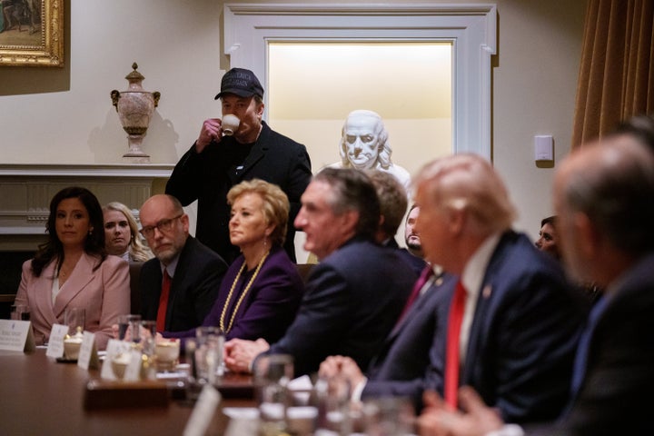 WASHINGTON, DC - FEBRUARY 26: Tesla and SpaceX CEO Elon Musk, head of the Department of Government Efficiency (DOGE), stands as U.S. President Donald Trump (R) speaks during a Cabinet meeting at the White House on February 26, 2025 in Washington, DC. Trump is holding the first Cabinet meeting of his second term. (Photo by Andrew Harnik/Getty Images)