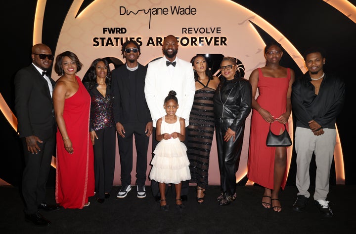 Kenny Kinder, Tragil Wade, Zaire Wade, Dwyane Wade, Kaavia Wade, Gabrielle Union, Jolinda Wade, Zaya Wade and Dahveon Morris attend Dwyane Wade's 003 Statues Are Forever Party With FWRD at Queen Miami Beach on October 25, 2024 in Miami Beach, Florida. 