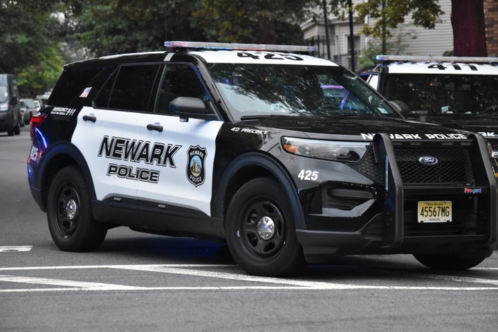 Joseph Azcona, 26, was sitting in his police vehicle Friday evening, participating in an illegal weapons sting, when he was fatally shot, authorities said. A similar Newark Police Department vehicle is pictured.