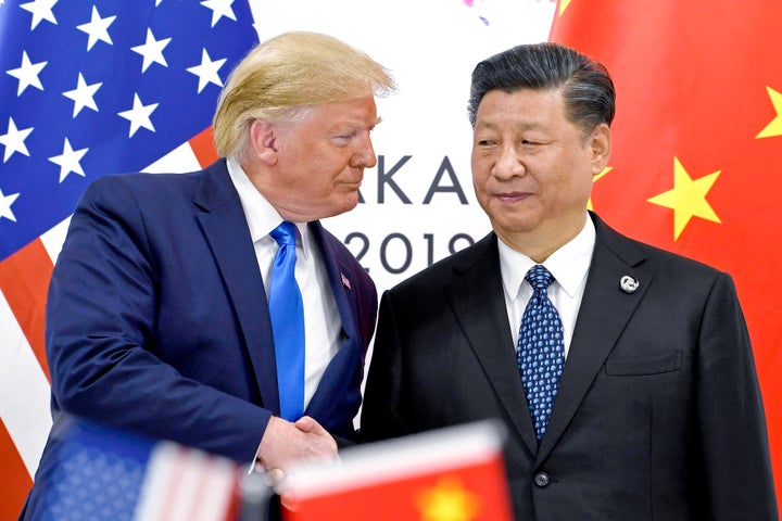 FILE - President Donald Trump, left, shakes hands with China's President Xi Jinping during a meeting on the sidelines of the G-20 summit in Osaka, Japan, June 29, 2019. (AP Photo/Susan Walsh, File)