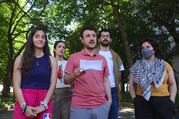 Columbia University student Mahmoud Khalil (C) speaks at a press briefing organized by pro-Palestinian protesters who set up a new solidarity encampment at the school's Morningside Heights campus on Friday, in New York City, on June 1, 2024.