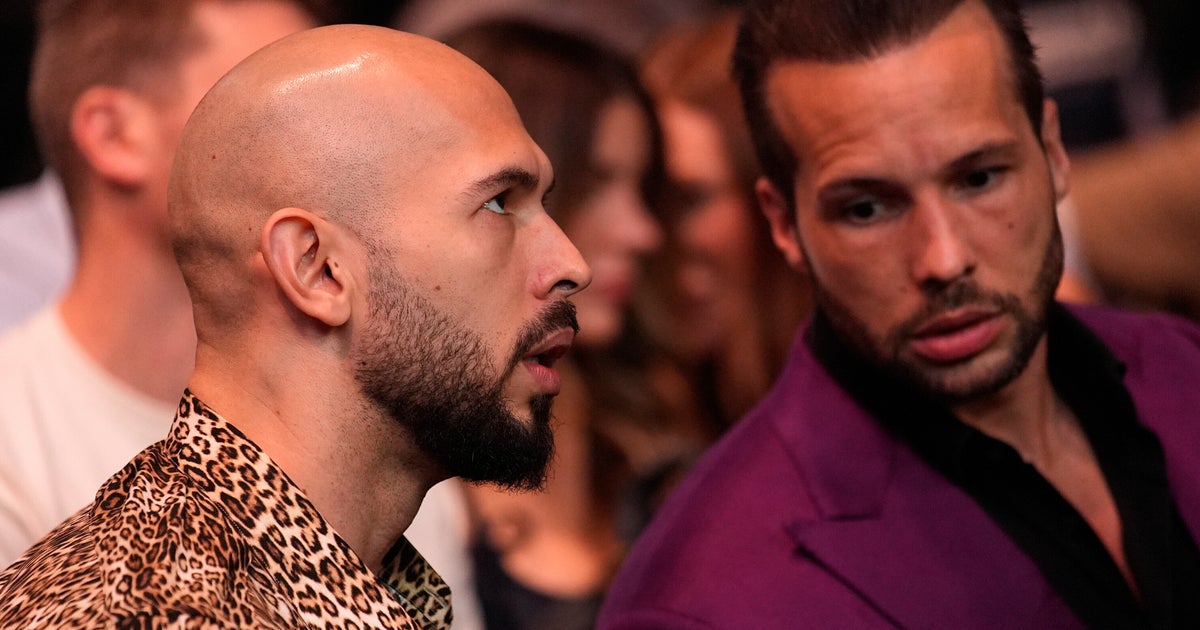 NextImg:Trump Ally Dana White Hugs Andrew Tate, Who Faces Trafficking Charges In Romania