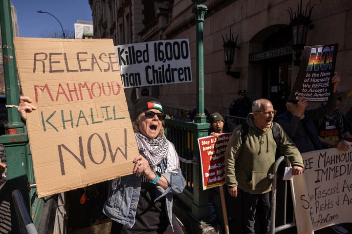 A protester raises signs during a demonstration in support of Palestinian activist Mahmoud Khalil outside Columbia University on March 10, 2025, in New York.