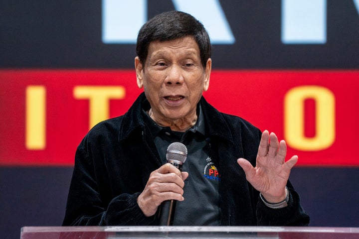 FILE - Former President of the Philippines Rodrigo Duterte speaks inside the Southorn Stadium during a thanksgiving gathering organized by Hong Kong-based Filipino workers for the former populist president in Hong Kong on March 9, 2025. (AP Photo/Vernon Yuen, File)