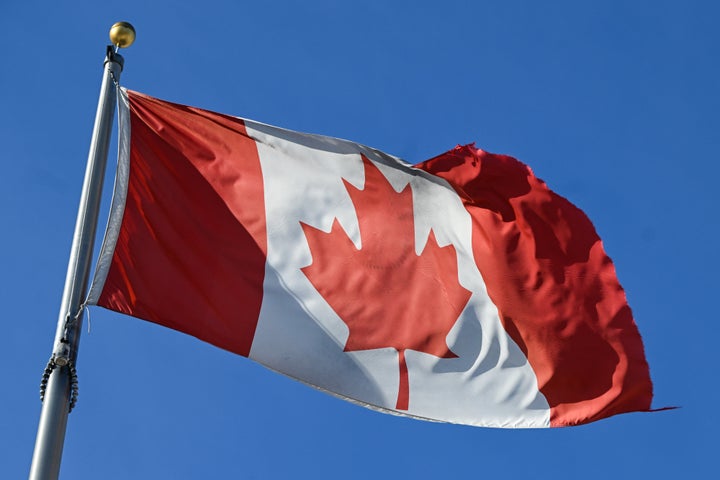 EDMONTON, ALBERTA FEBRUARY 20:The Canadian national flag waves proudly in Edmonton, Alberta, Canada, on February 20, 2025. (Photo by Artur Widak/NurPhoto via Getty Images)