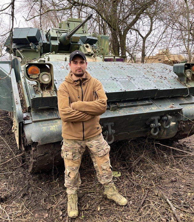 The author in front of his Bradley.