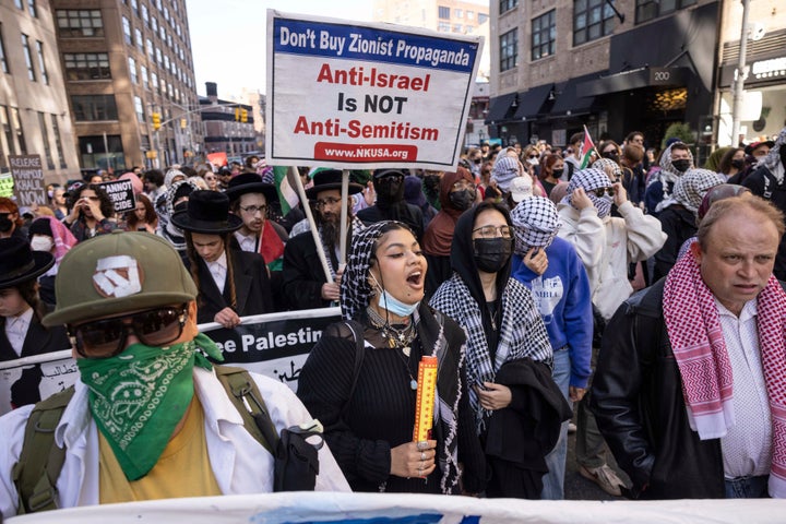 Protesters demonstrate in support of detained Palestinian activist Mahmoud Khalil at Washington Square Park, on Tuesday in New York.