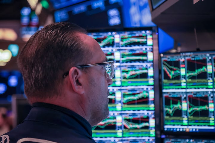 A trader works on the floor of the New York Stock Exchange (NYSE) in New York, US, on Tuesday, March 11, 2025. The stock market on Monday shifted towards defensive sectors such as energy, consumer staples, and utility companies, which tend to fare well during recessions, as investors sought shelter from the potential economic storm. Photographer: Michael Nagle/Bloomberg via Getty Images