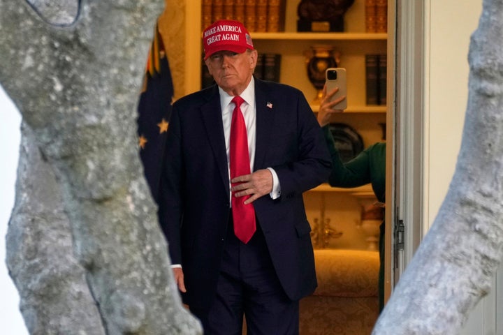 FILE - President Donald Trump walks from the Oval Office to depart on Marine One on the South Lawn of the White House in Washington, Feb. 28, 2025. (AP Photo/Ben Curtis, File)