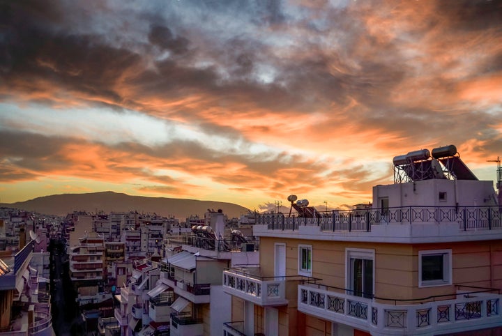 Sunrise over the city. Piraeus,Grecce