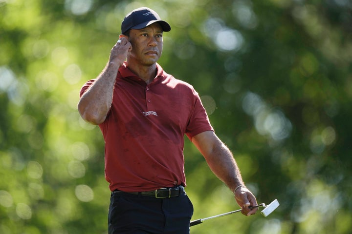 Tiger Woods walks to the green on the fifth hole during final round at the Masters golf tournament at Augusta National Golf Club on April 14, 2024, in Augusta, Ga.