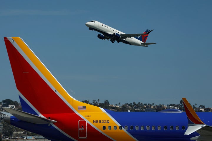 A Delta Connection, operated by SkyWest Airlines Embraer E175LR aircraft departs from San Diego International Airport for Los Angeles on March 4, 2025 in San Diego, California. (Photo by Kevin Carter/Getty Images)