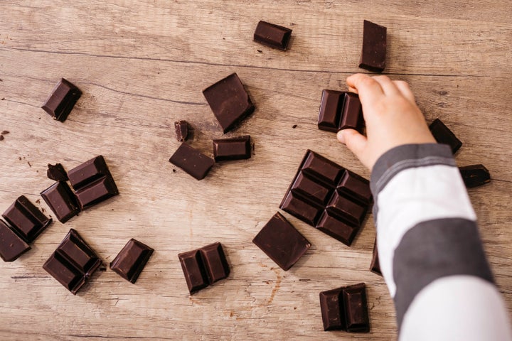 An ounce of dark chocolate with 60-69% cacao contains 24 mg of caffeine, which is about the same amount as a quarter cup of coffee.