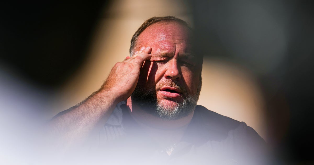 NextImg:Alex Jones Blames 'Globalists' After Infowars Writer Killed During Car Burglary