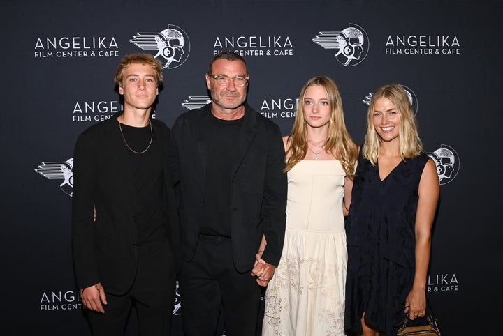 Liev Schreiber with his son Sasha (left), daughter Kai (second from right) and wife Taylor (far right) at the premiere of "Across The River And Into The Trees" last year in New York City.