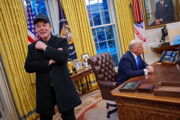 Elon Musk, the CEO of SpaceX and Tesla, uses the R-word freely. President Donald Trump, pictured in the background, made fun of a disabled reporter on the campaign trail in 2016.